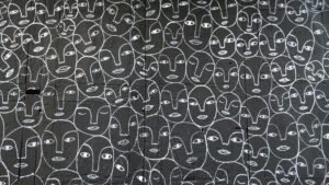 abstract black and white image of many faces